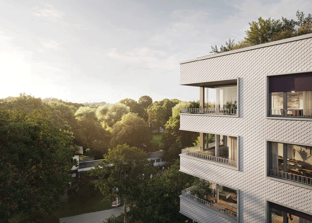 Außenansicht mit Balkonen vor Bäumen im Neubauprojekt Haus Claude Untergiesing