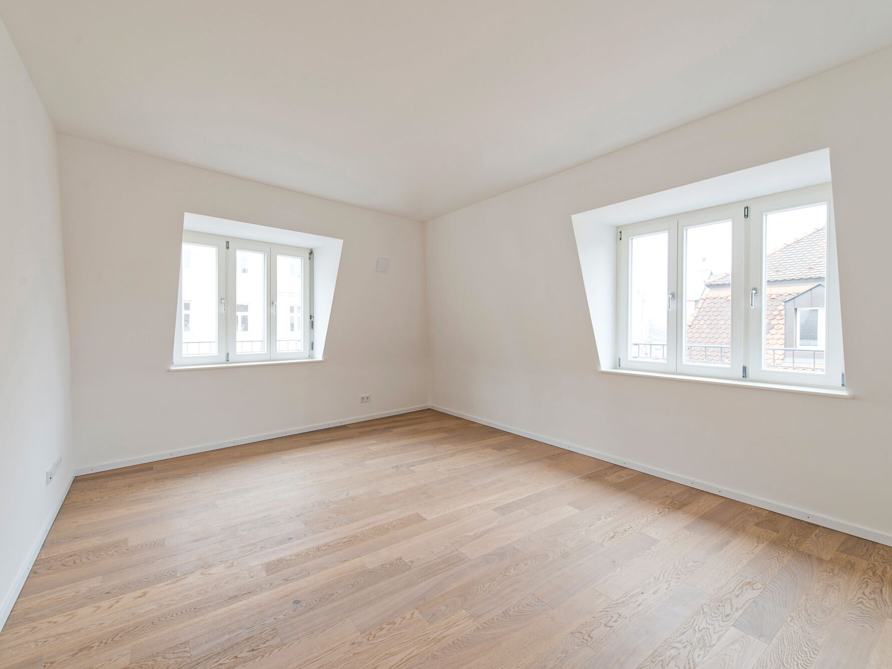 Schlafbereich der 3-Zimmer-Wohnung I69 in München Bogenhausen mit Fenstern