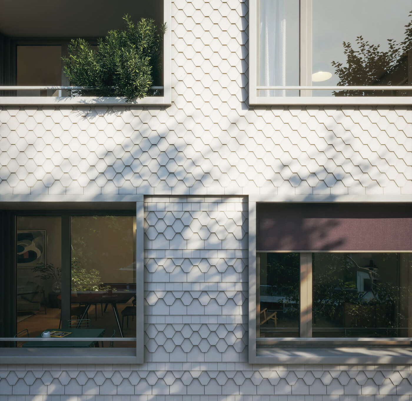 Fassade des Neubauprojekts Haus Claude in Untergiesing mit zeitloser Architektur