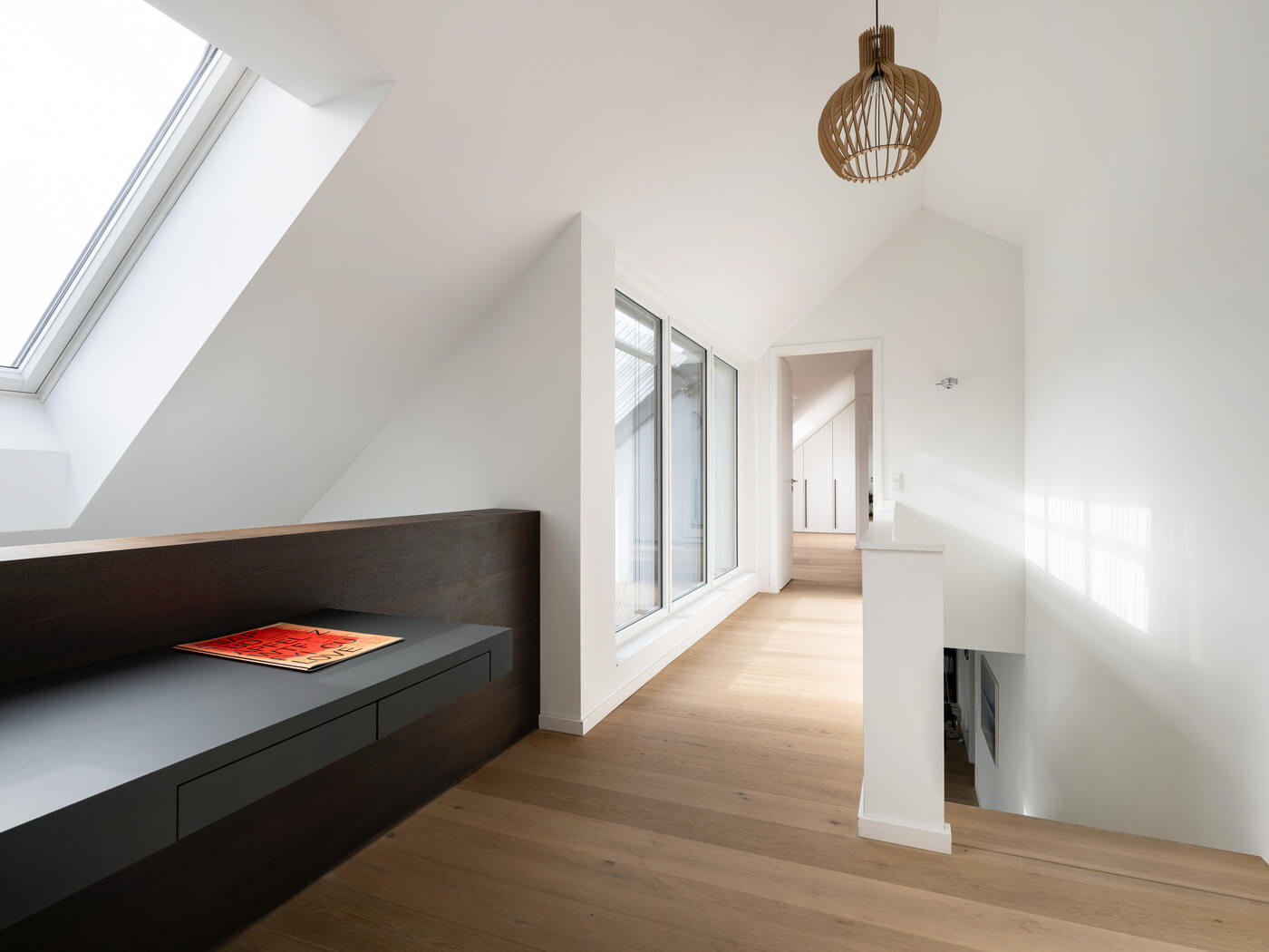 Galerieebene der Eigentumswohnung W1.16 im Bereiteranger 15 mit Einbauten.