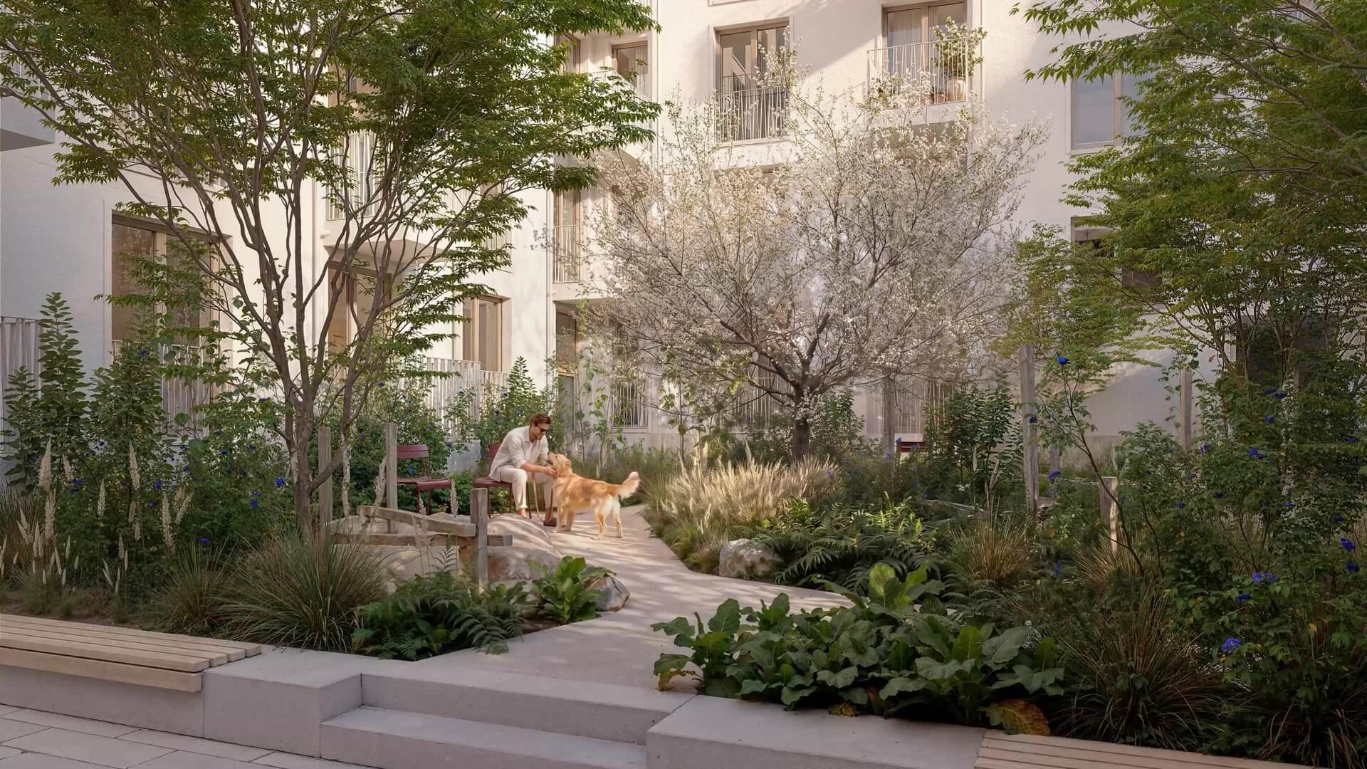 Gartenhof mit Bepflanzung und Sitzplätzen im Neubau Haus Claude in Untergiesing