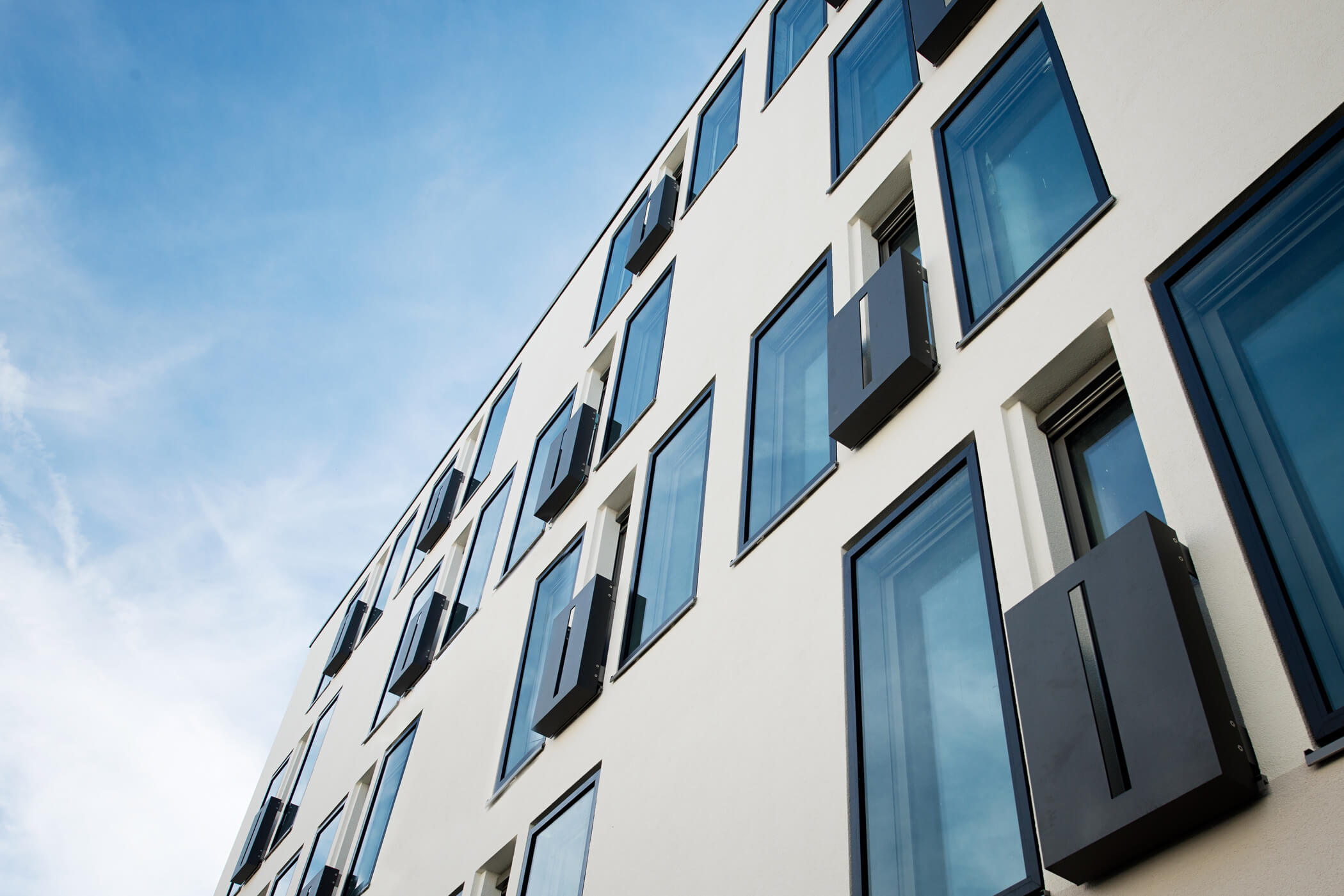 Nahaufnahme der Fassade von Wohnprojekt in der Hermann-Lingg-Straße