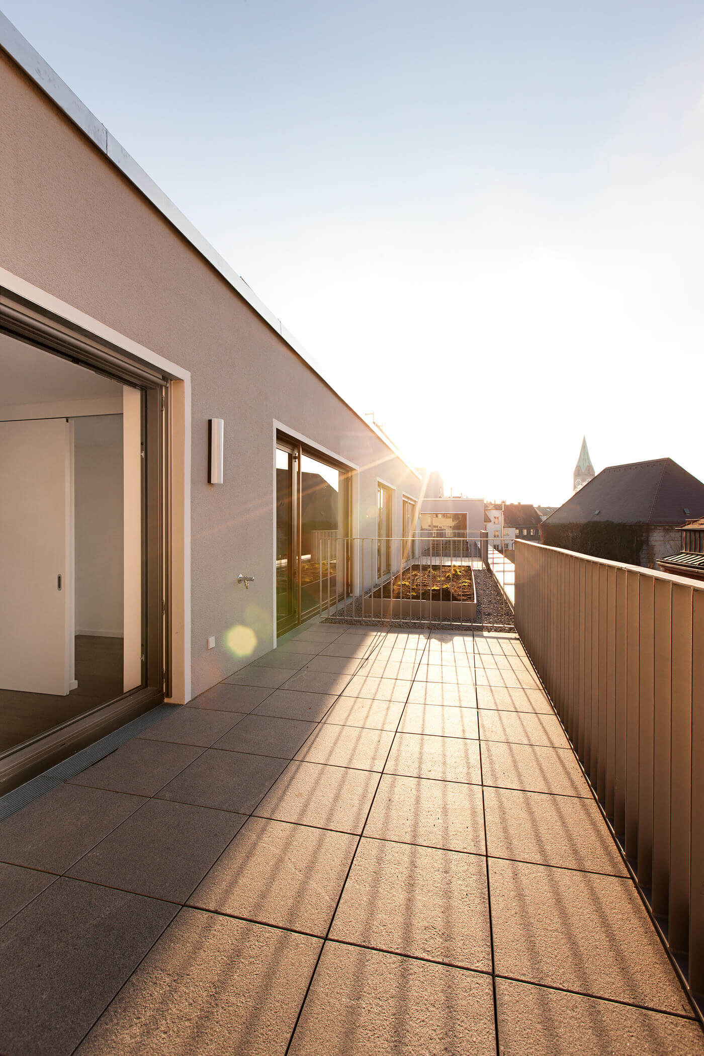 Sonnenuntergang am Neubauprojekt Hofstatt in Münchens Innenstadt