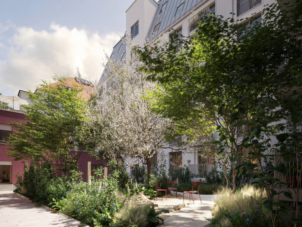 Gartenhof mit Bepflanzung und Sitzplätzen im Neubau Haus Claude in Untergiesing