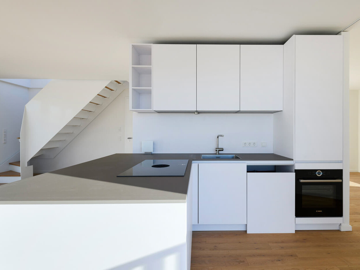 Einbauküche der Mietwohnung D.23 im kupa-Quartier München-Pasing mit Kochfeld