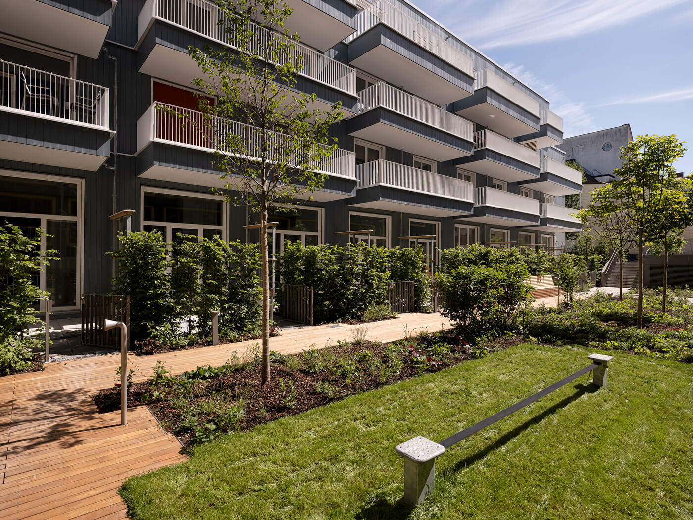 Fassadenansicht des Hofhauses im Neubauprojektes Vinzent in München Neuhausen
