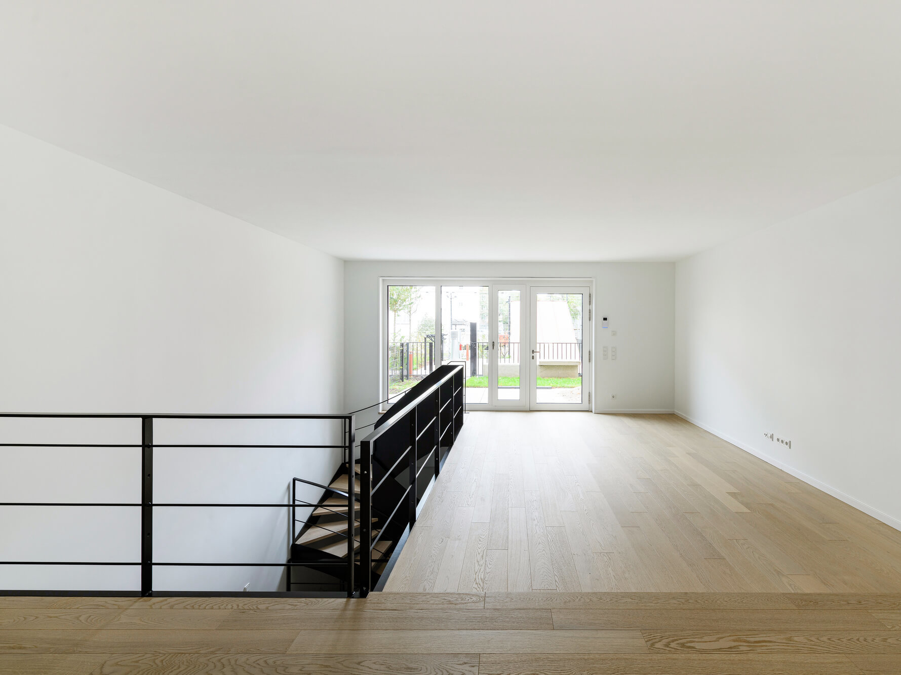 Galerieebene mit Terrassentür in Wohnung GL.11, Neubau Van B, München Schwabing