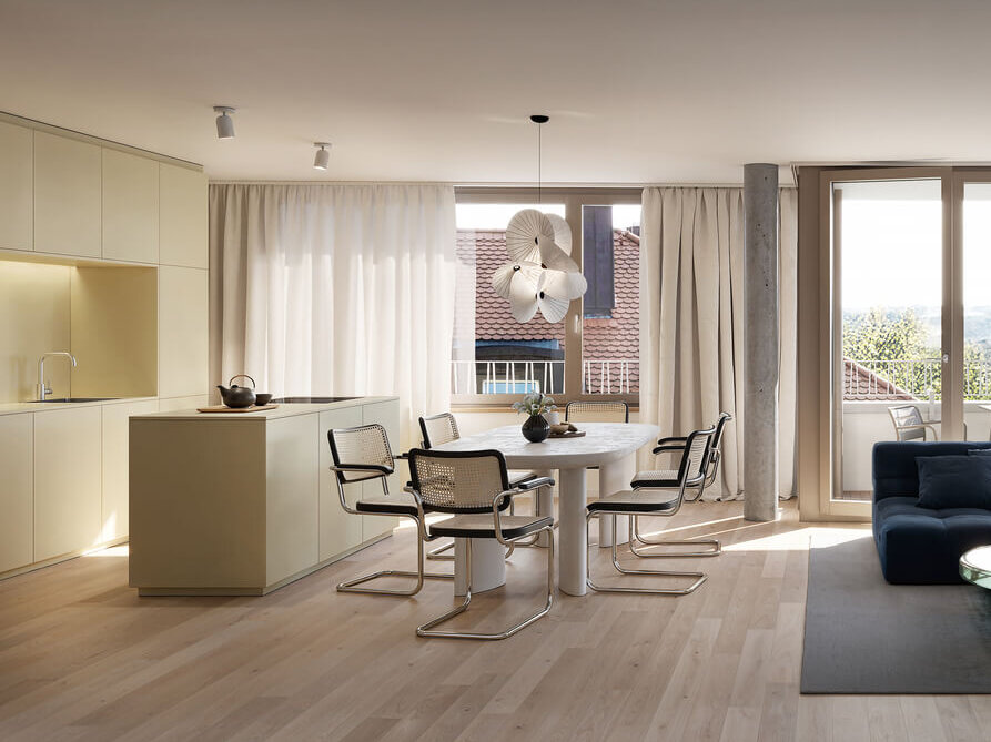 Essbereich im Neubauprojekt Haus Claude in Untergiesing mit Küche und Balkon