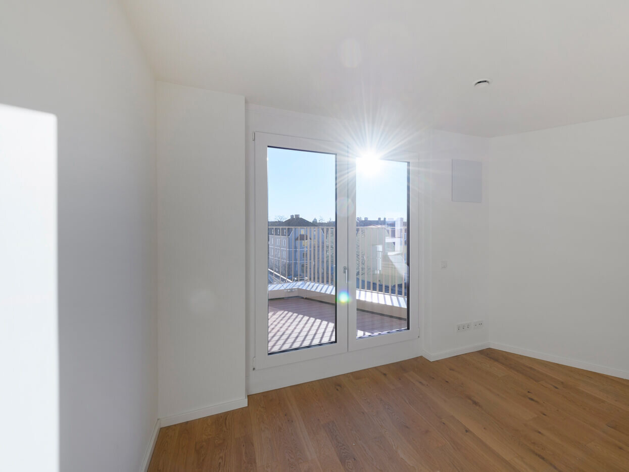 Schlafbereich der Mietwohnung im kupa-Quartier Pasing mit Balkon