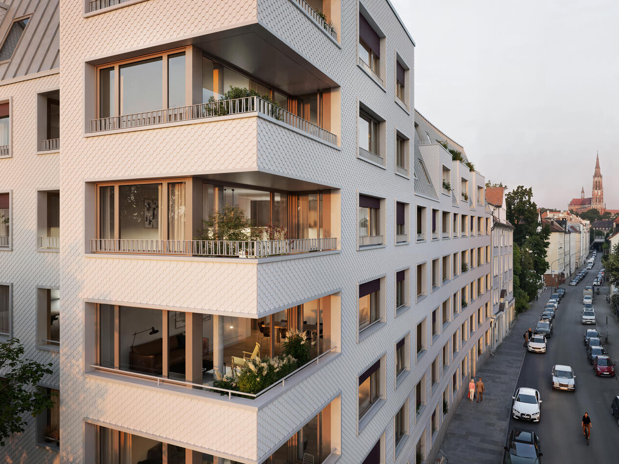 Eckansicht Neubauprojekt Haus Claude in Untergiesing mit Loggien bei Abendlicht