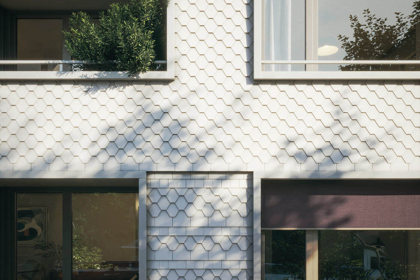 Fassade des Neubauprojekts Haus Claude in Untergiesing mit zeitloser Architektur