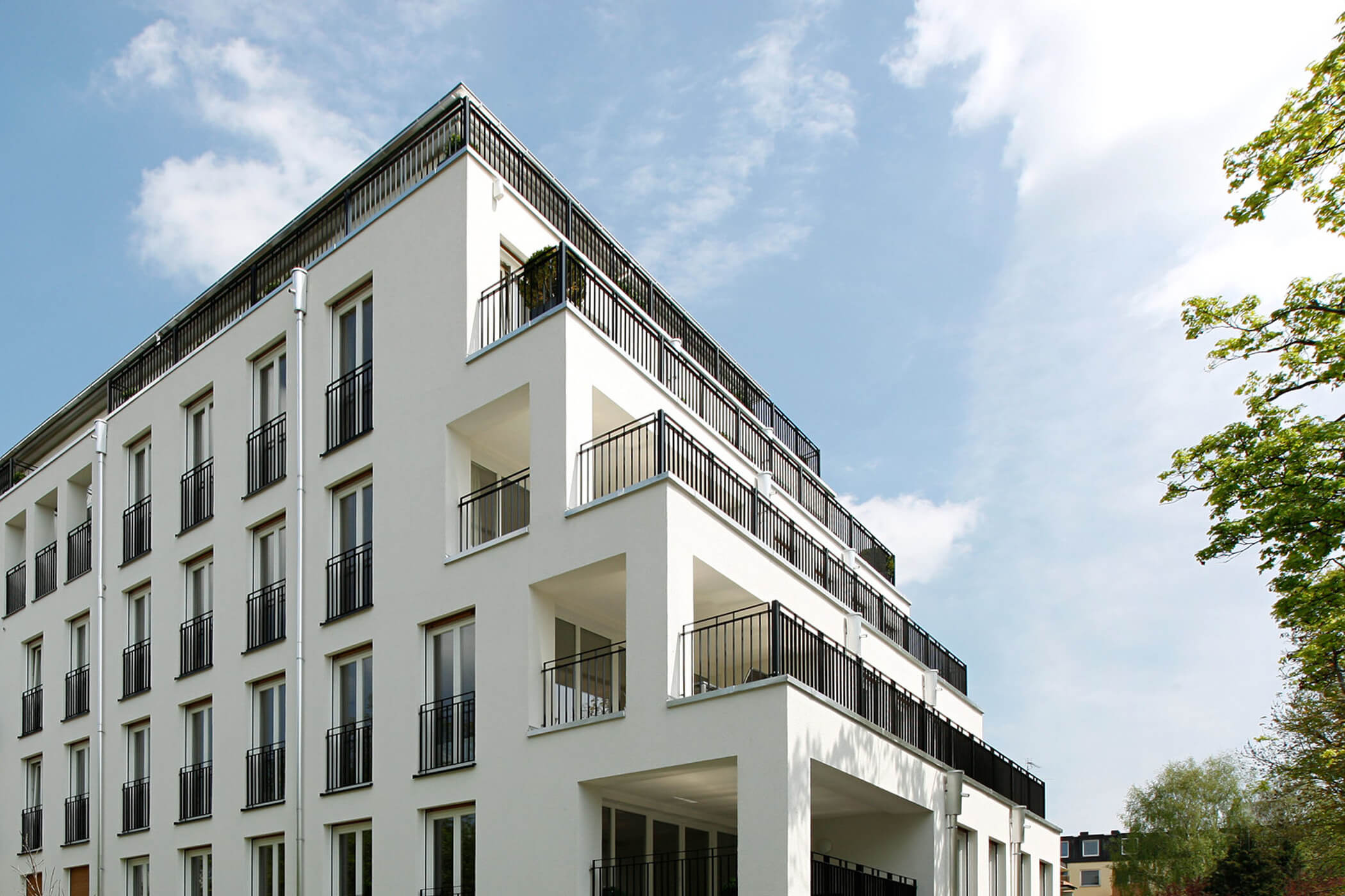 Nahaufnahme der Fassade von Wohnprojekt in der Erich-Kästner-Straße