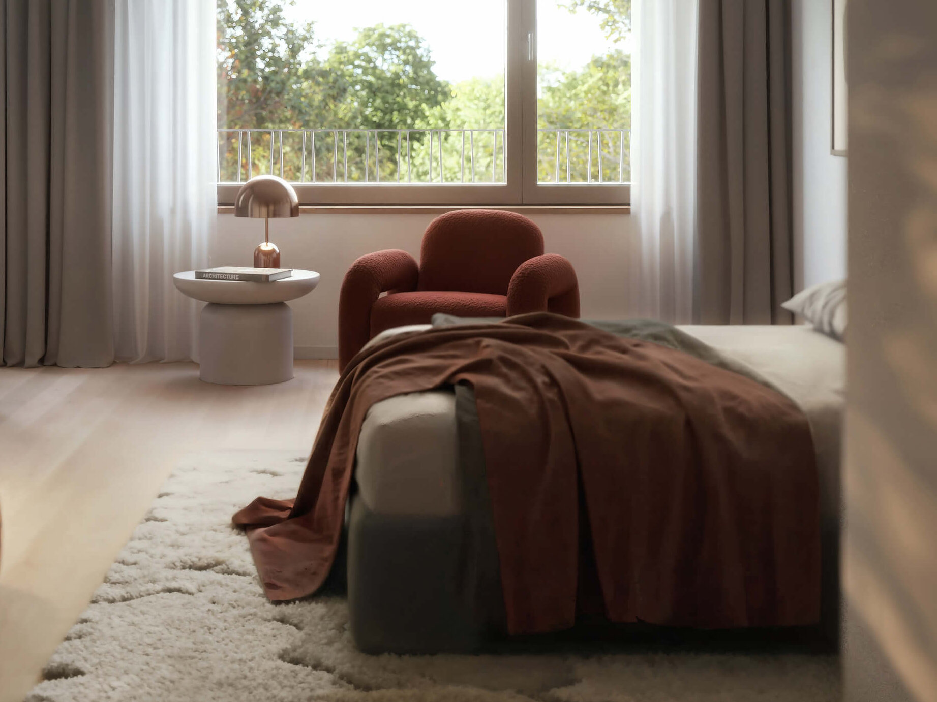 Schlafzimmer mit Sessel und großem Fenster im Neubau Haus Claude, Untergiesing