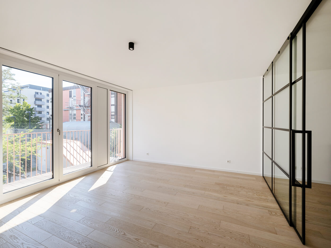 Obergeschoss mit Balkon im Neubauprojekt Van B in München-Schwabing